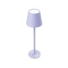 Lampada da tavolo LED senza fili Muitomas viola che illumina un tavolo da esterno.