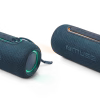 Due speaker Muse M-780 BTB posizionati ai lati di un laptop, a creare un setup stereo TWS. La scena illustra la potenza e l'immersività della funzione di accoppiamento